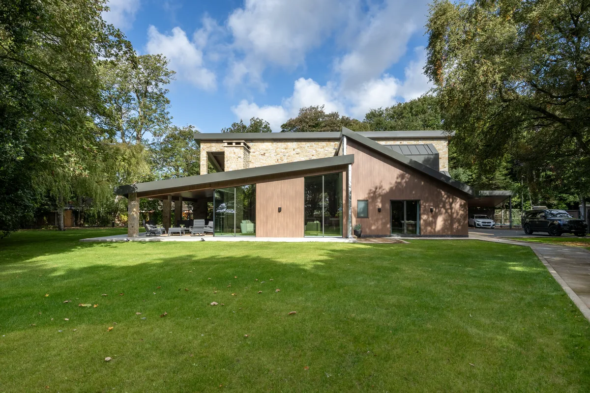 The house seen across the lawn