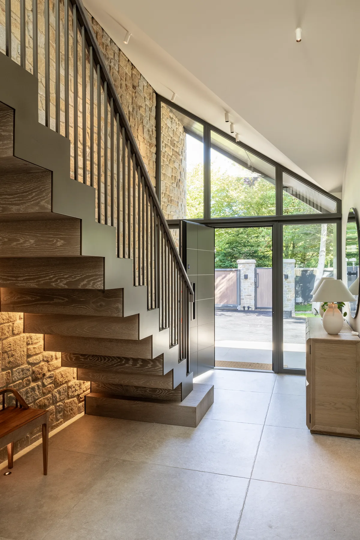 The entrance hall and open stair in daylight