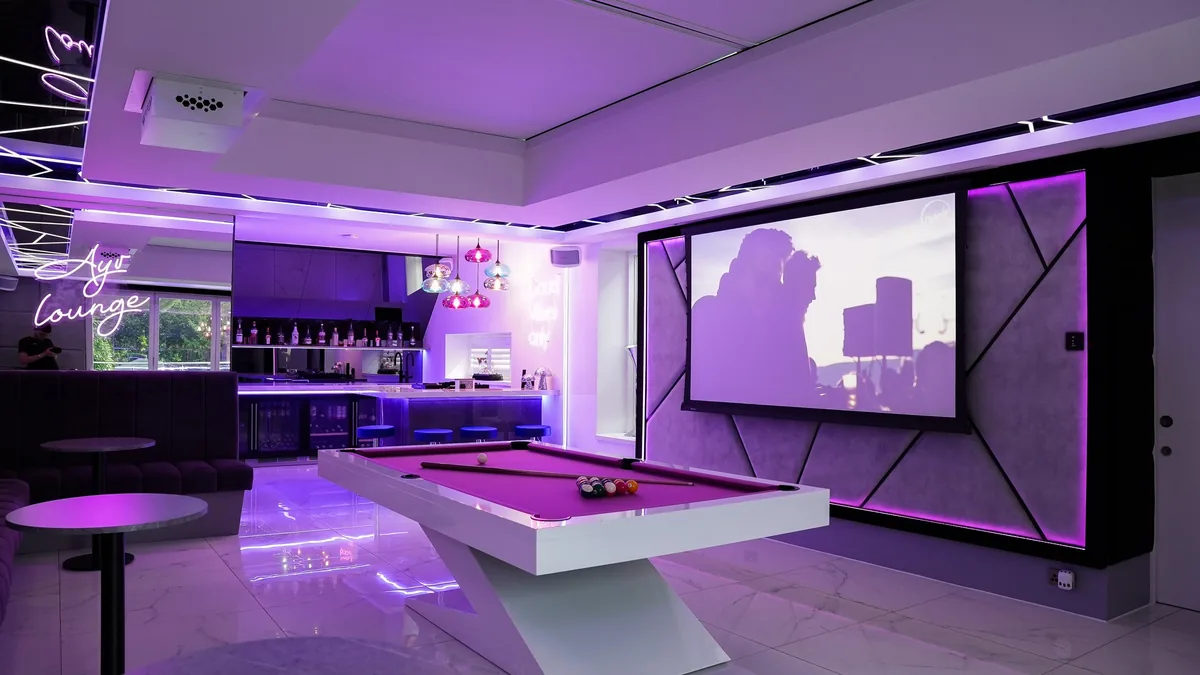 A private bar with concealed speakers